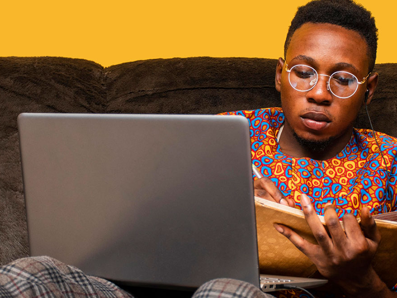 Learner studying independently on a laptop.